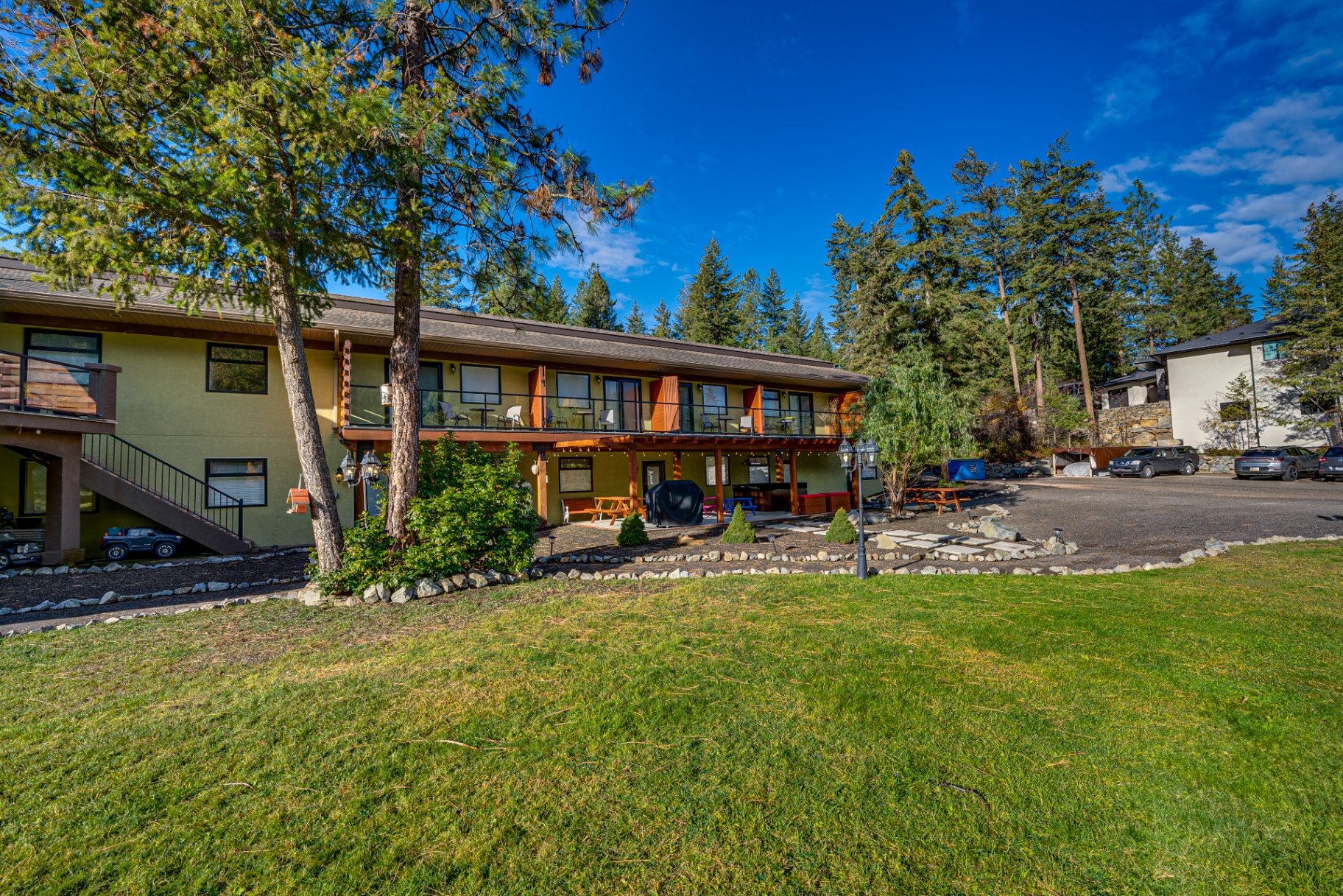 Building exterior with green lawns and natural landscaping