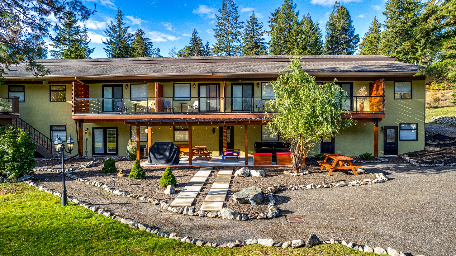 Full facade view of The Haven building with hot tub area