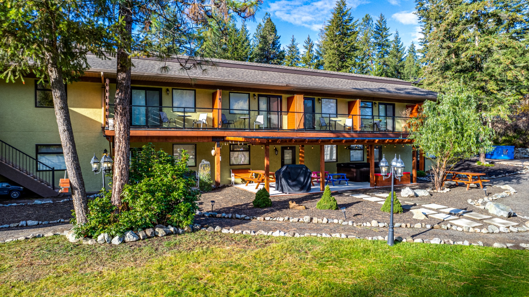 The Haven exterior showing covered patio and outdoor amenities